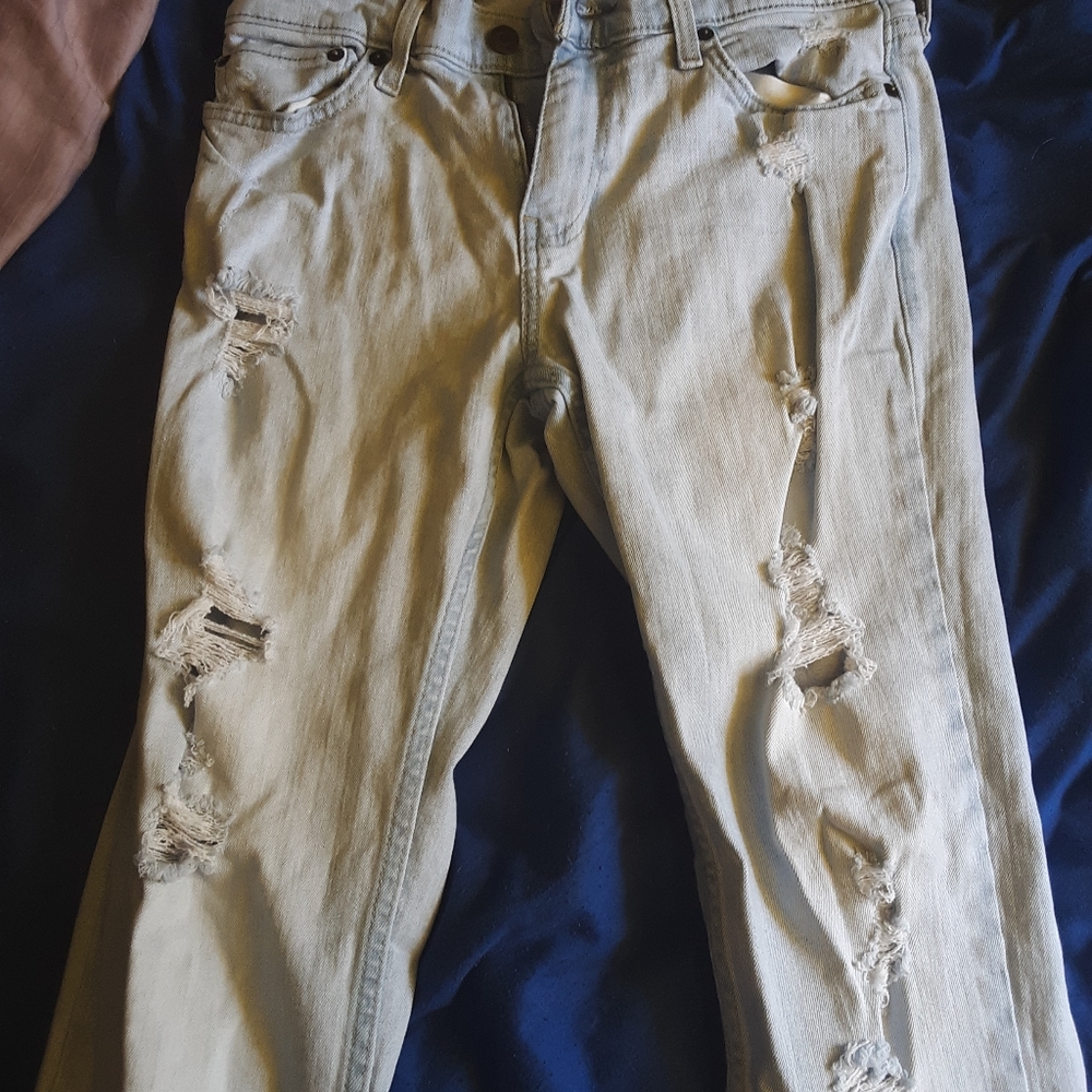 Destroyed acid jeans